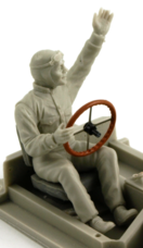Ready-to-paint figurine greeting with a steeringwheel in the right hand