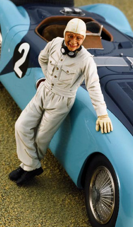 Suggestion of display painted kit of the driver standing against the Bugatti